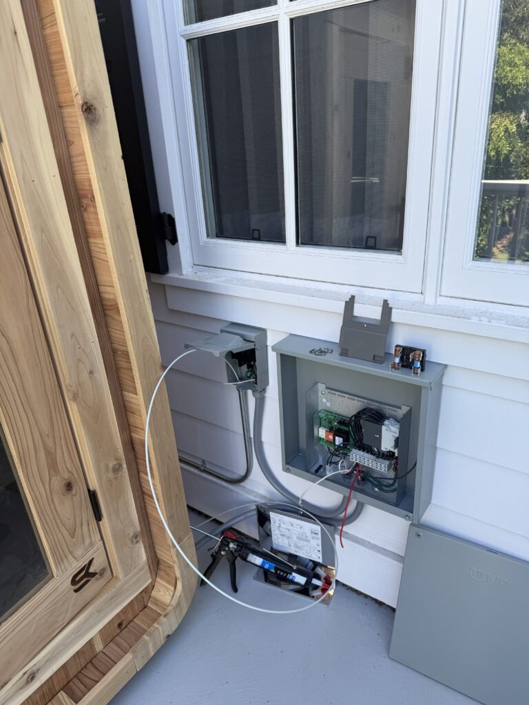 Sauna electrical control boxes, wiring connections, and safety setup by Brentwood Electrical Experts.